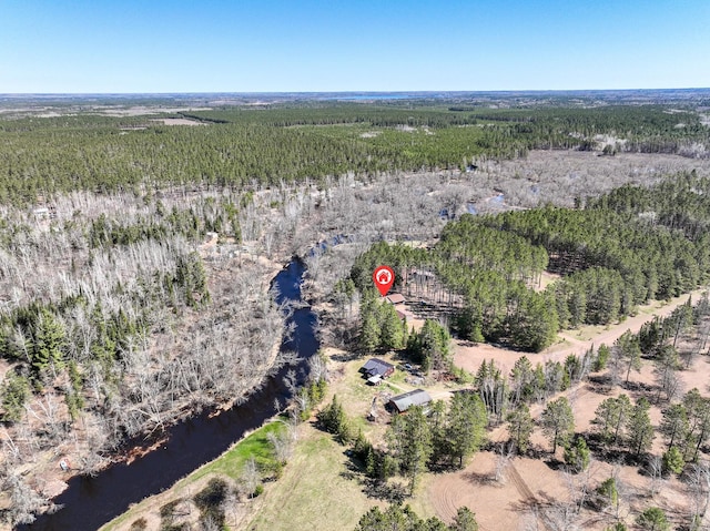 bird's eye view featuring a water view and a view of trees