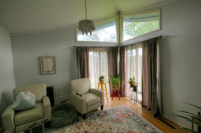 1224 Tee Up Ln, Red Wing, MN 55066 - sitting room with wood finished floors, lofted ceiling, and wood ceiling