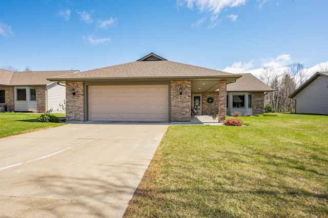 single story home with concrete driveway, brick siding, an attached garage, and a front lawn