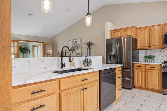 kitchen featuring a sink, stainless steel appliances, light tile patterned floors, backsplash, and vaulted ceiling