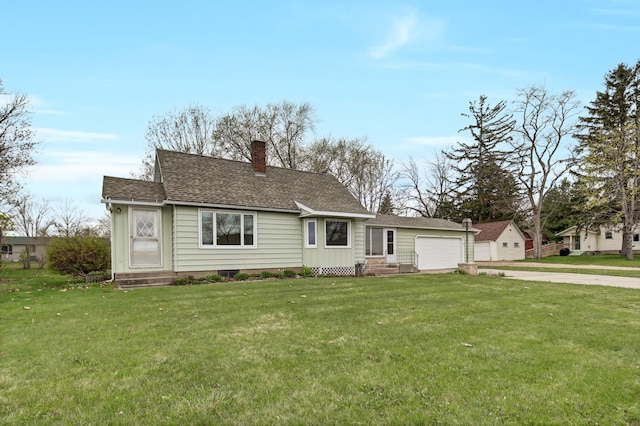 1217 High St, Lake City, MN 55041 - view of front of property featuring a chimney, entry steps, concrete driveway, and a front lawn