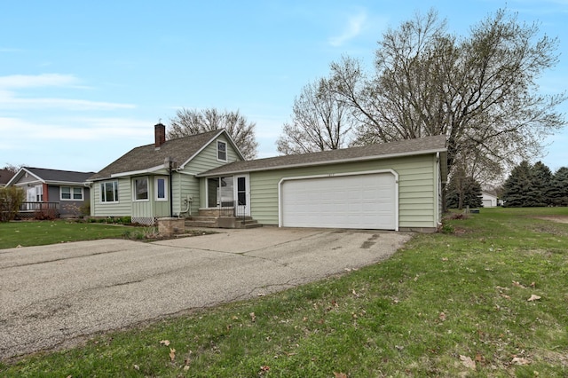 1217 High St, Lake City, MN 55041 - ranch-style house featuring an attached garage, driveway, and a front lawn