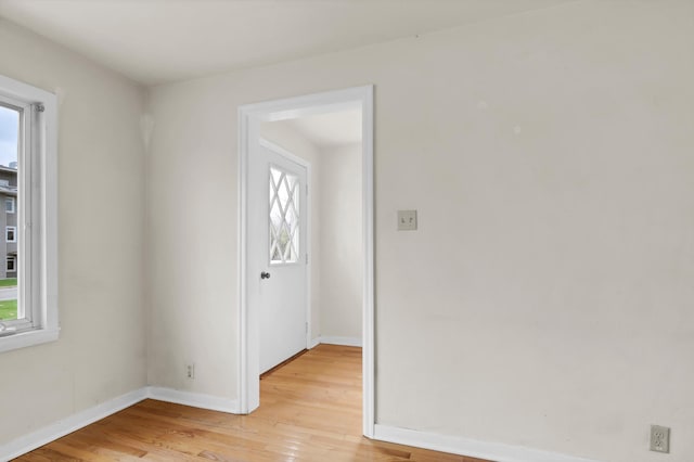 1217 High St, Lake City, MN 55041 - empty room featuring light wood-style floors and baseboards