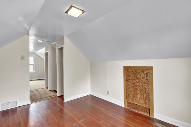 1217 High St, Lake City, MN 55041 - bonus room with hardwood / wood-style flooring, baseboards, and vaulted ceiling