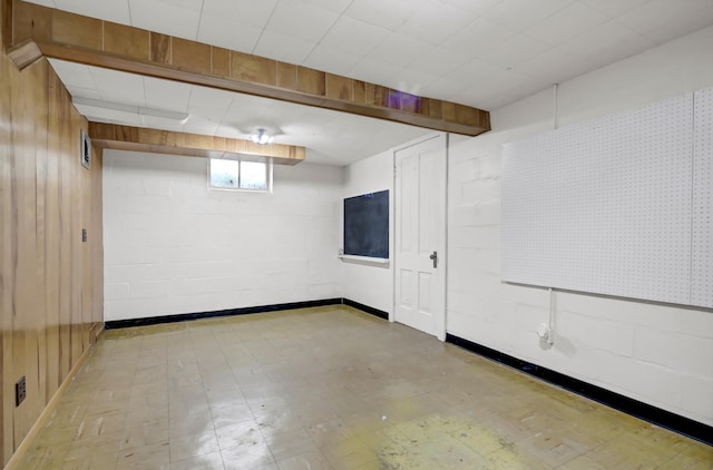 1217 High St, Lake City, MN 55041 - below grade area with tile patterned floors and wooden walls