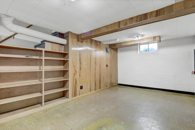 1217 High St, Lake City, MN 55041 - below grade area featuring tile patterned floors and wooden walls