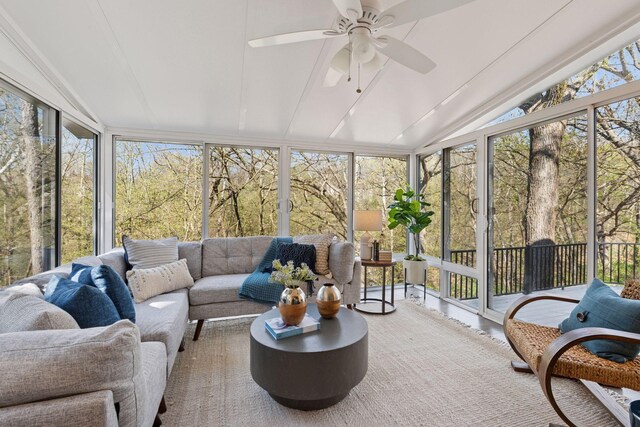 sunroom / solarium with an outdoor living space and a ceiling fan