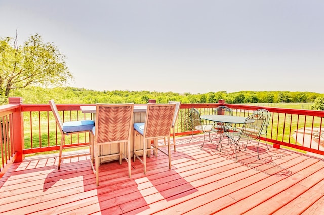 deck featuring outdoor dining space