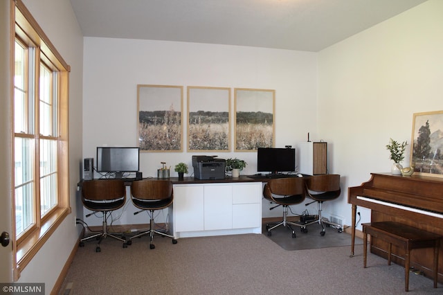 office area with baseboards and carpet flooring