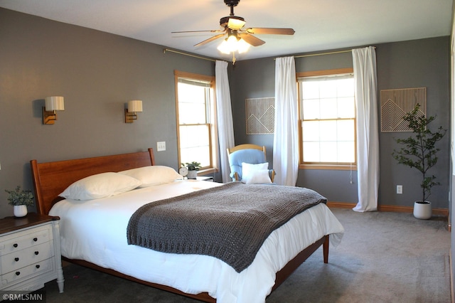 bedroom with baseboards, ceiling fan, and carpet