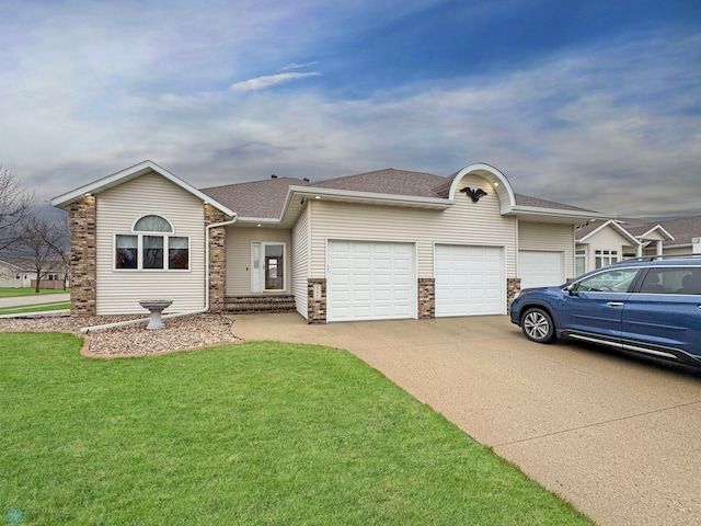 ranch-style house featuring concrete driveway, an attached garage, a shingled roof, and a front lawn