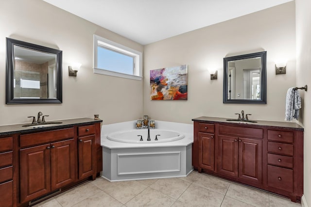 5435 Yellowstone Trl, Minnetrista, MN 55331 - full bathroom featuring tile patterned floors, a bath, and two vanities