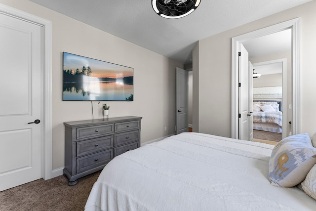 5435 Yellowstone Trl, Minnetrista, MN 55331 - bedroom featuring dark colored carpet and baseboards