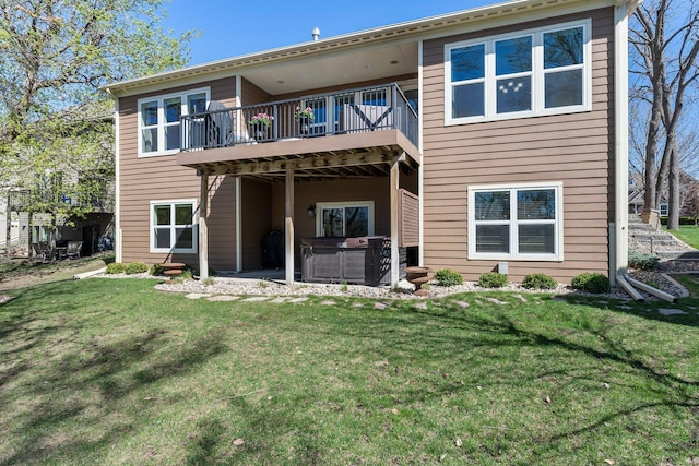5435 Yellowstone Trl, Minnetrista, MN 55331 - rear view of property with a hot tub, a yard, and a wooden deck