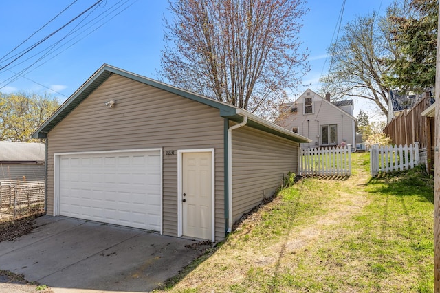 detached garage with fence