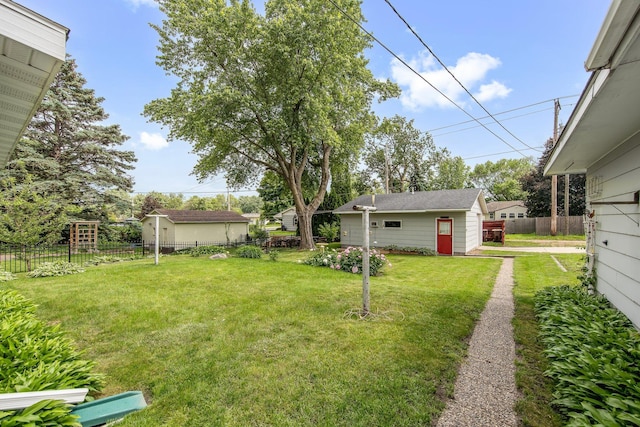 517 2nd St, Waconia, MN 55387 - fenced backyard with an outbuilding