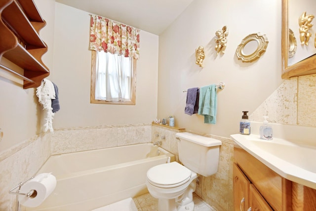 517 2nd St, Waconia, MN 55387 - bathroom featuring a bath, vanity, wainscoting, and tile patterned flooring