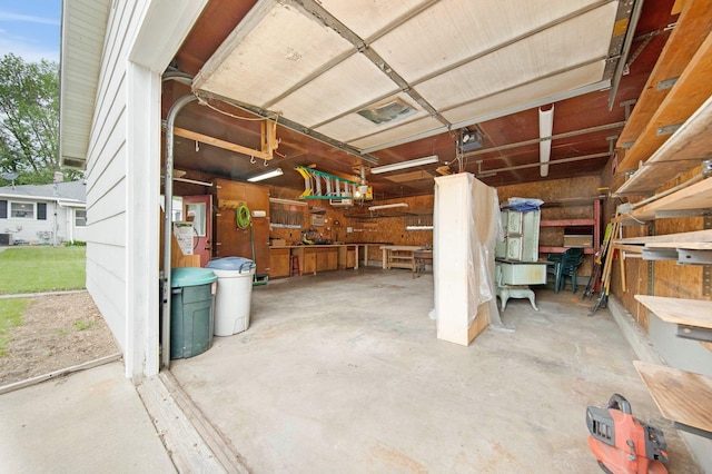517 2nd St, Waconia, MN 55387 - basement with a workshop area and a garage