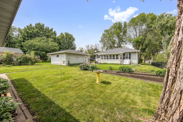 517 2nd St, Waconia, MN 55387 - view of front facade featuring a front lawn