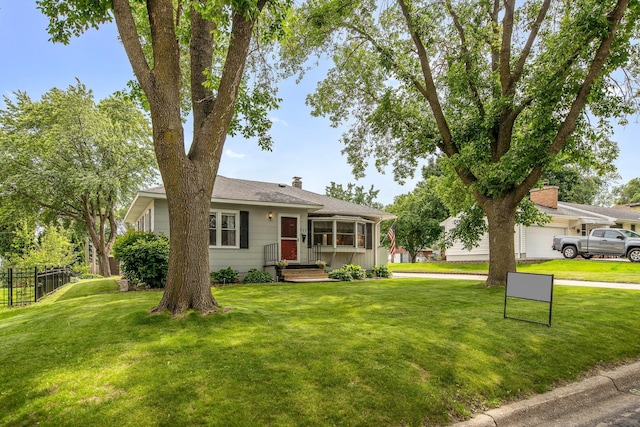 517 2nd St, Waconia, MN 55387 - view of front of property with a chimney and a garage