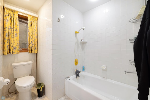 803 10th Ave N, Fargo, ND 58102 - bathroom with toilet, tile walls, and shower / washtub combination