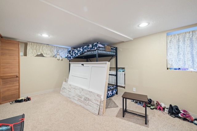 803 10th Ave N, Fargo, ND 58102 - finished below grade area featuring recessed lighting, baseboards, and carpet