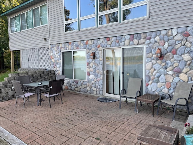 view of patio with outdoor dining area
