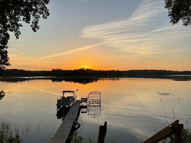 view of dock with a water view and boat lift
