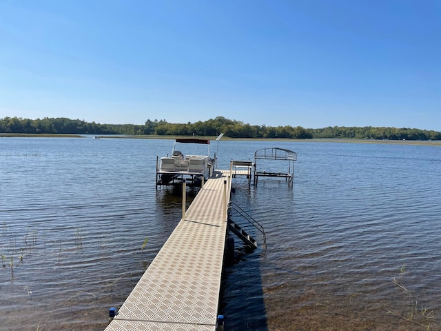 view of dock featuring a water view and boat lift
