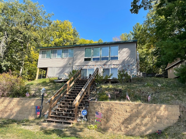 9849 Maple Ridge Rd, Garrison Twp, MN 56450 - back of house with stairway