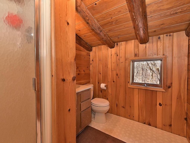 20703 Aspen Dr, Grand Rapids, MN 55744 - full bathroom featuring beam ceiling, wooden ceiling, tile patterned floors, toilet, and wooden walls