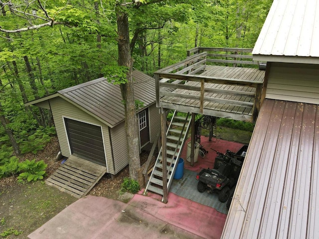 20703 Aspen Dr, Grand Rapids, MN 55744 - garage with a view of trees