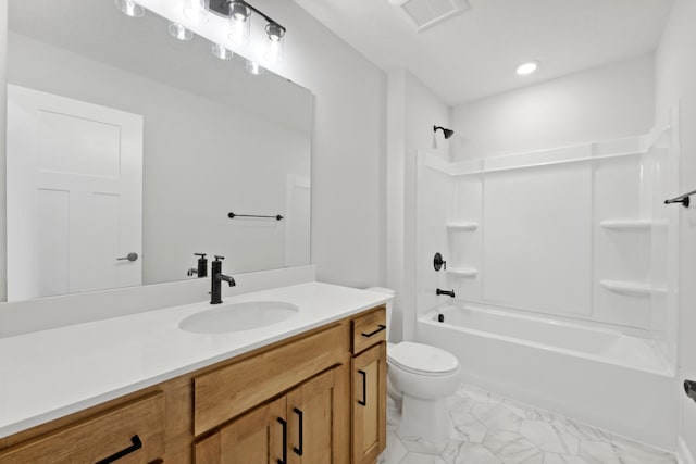 bathroom featuring toilet, marble look tiles, vanity, shower / bathtub combination, and recessed lighting