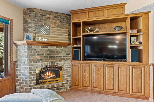 living room with light colored carpet and a fireplace