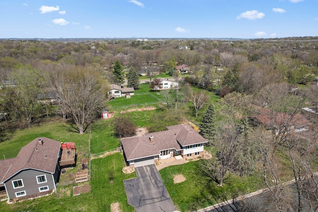 aerial view with a wooded view