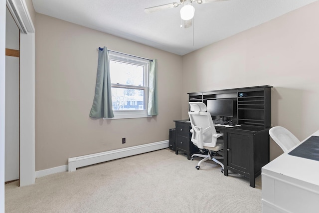 office area with carpet floors, a ceiling fan, baseboards, and a baseboard radiator
