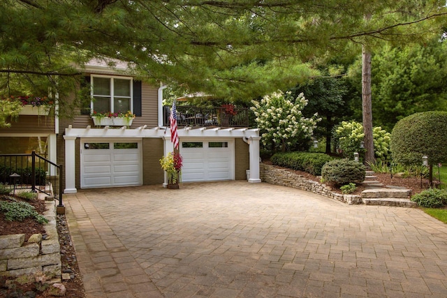 garage featuring decorative driveway