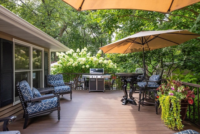 wooden terrace with area for grilling