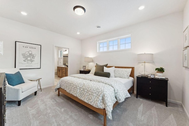 bedroom featuring carpet floors, baseboards, recessed lighting, and connected bathroom