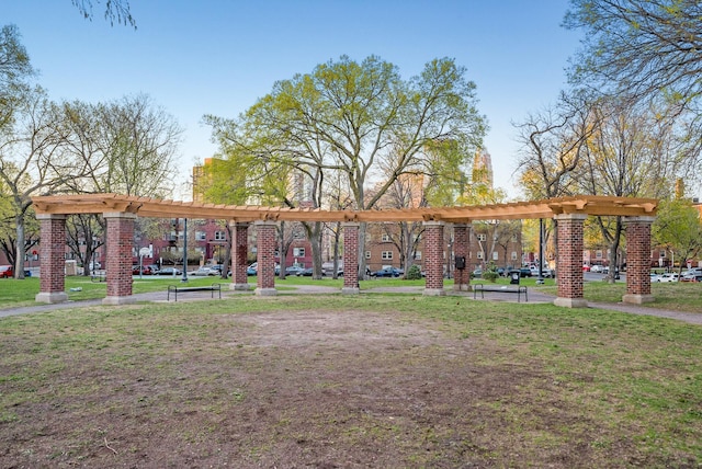 view of community featuring a yard