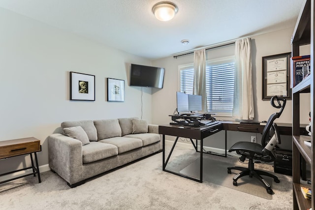 office space with baseboards and carpet