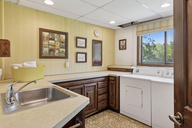 laundry area with separate washer and dryer, electric panel, and recessed lighting