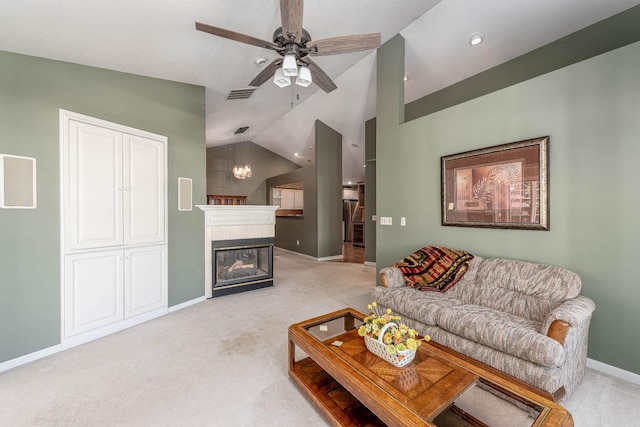 267 Plum Run, Le Sueur, MN 56058 - living area with ceiling fan, visible vents, vaulted ceiling, baseboards, and light carpet