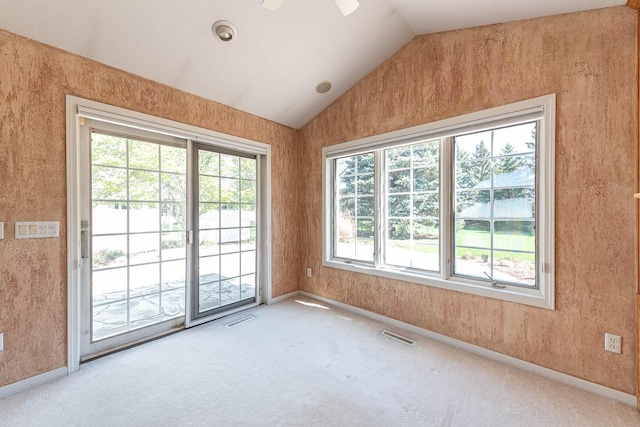 267 Plum Run, Le Sueur, MN 56058 - carpeted spare room with ceiling fan, vaulted ceiling, baseboards, and visible vents