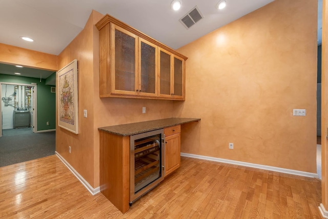 267 Plum Run, Le Sueur, MN 56058 - bar featuring visible vents, light wood-style floors, wine cooler, and baseboards