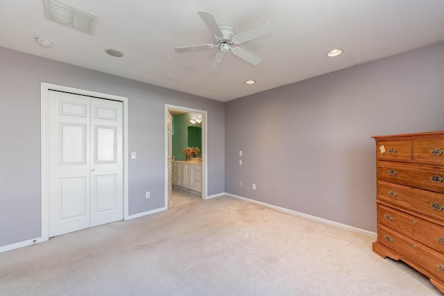 267 Plum Run, Le Sueur, MN 56058 - unfurnished bedroom with visible vents, baseboards, a closet, ensuite bathroom, and light carpet