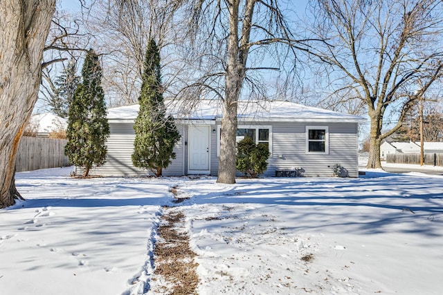 view of front of house with fence