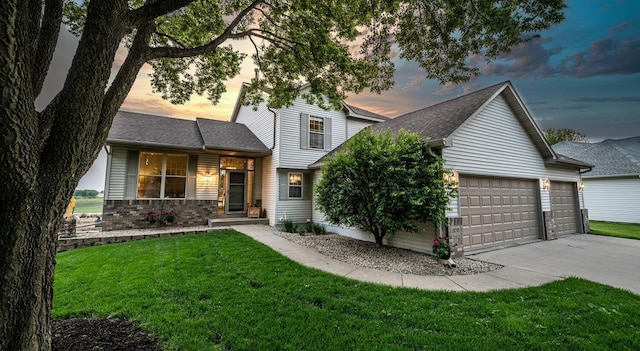 19288 Evenston Dr, Farmington, MN 55024 - view of front of home with a garage, concrete driveway, a yard, and roof with shingles