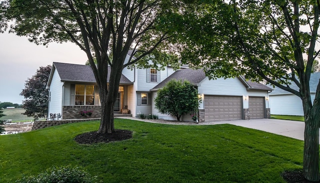 19288 Evenston Dr, Farmington, MN 55024 - view of front facade with a front yard, driveway, a garage, and roof with shingles