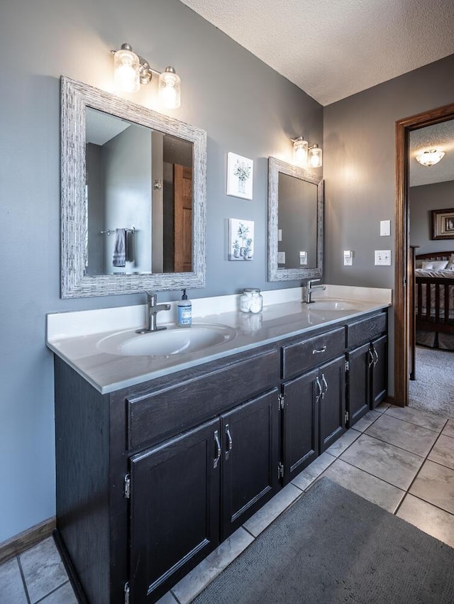 19288 Evenston Dr, Farmington, MN 55024 - full bathroom with double vanity, a textured ceiling, and tile patterned flooring
